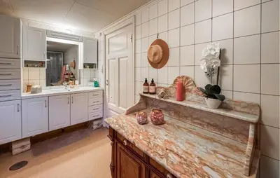 a kitchen with a counter top and a sink at Nice Home In Braskereidfoss With Wifi in Braskereidfoss