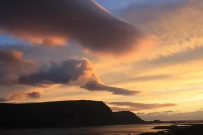 a sunset on the beach with a cloud formation at Gunnabuda in Longva