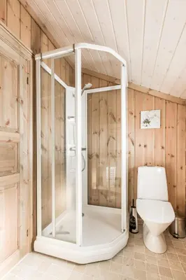 a shower in a bathroom with a toilet at Stranda Fjellgrend 3 bedrooms - 68A in Stranda