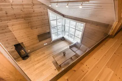an overhead view of a living room with a couch and a window at Stranda Fjellgrend 3 bedrooms and loft - 80C in Stranda