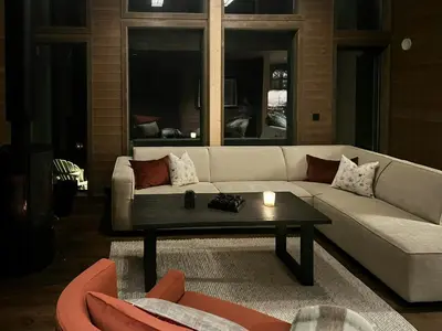 a living room with a couch and a coffee table at Warm And Inviting Cabin Near Norefjell in Eggedal