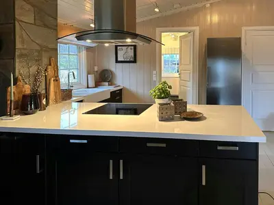 a kitchen with a sink and a counter top at Mountain Cabin With Magical Views At Dagalifjell in Uvdal