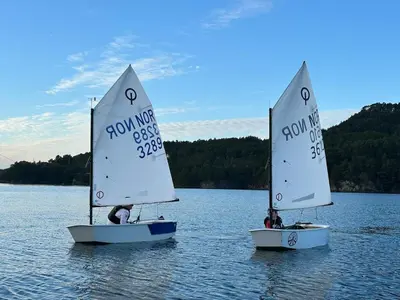 two small sailboats in the water on a lake at Villa Hagavik, studio apartment Peter