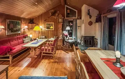 a living room with a couch and a table at 4 Bedroom Nice Home In Trysil in Trysil
