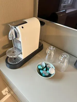 a mixer on a counter with a bowl of pills at Spacious Group Villa with Jacuzzi and Views in Askøy