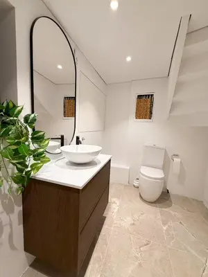 a bathroom with a sink and a toilet at Soft Stay Apartment in Bergen