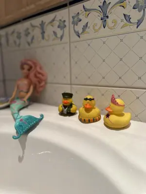 a group of rubber ducks sitting on top of a bath tub at Family cabin in Hafjell, ski in-ski out in Hafjell