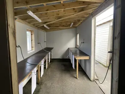 a row of benches in a room with a window at 5 person holiday home in Flatanger in Vik
