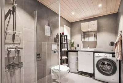 a bathroom with a shower toilet and a sink at Exclusive and Uniqe Apartment - Ski in ski out! in Vossevangen