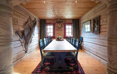 a dining room with a wooden table and chairs at Amazing Apartment In Bjorli With Wifi in Bjorli