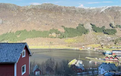 a view of a body of water with a mountain at Cozy Home In Stongfjorden With House Sea View in Stongfjorden