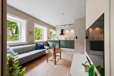 a living room with a couch and a table at Cozy Apartment in Bergen in Bergen