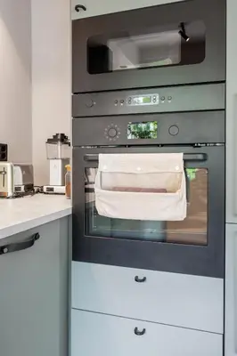 a kitchen with an oven with a towel in it at Cozy Apartment in Bergen in Bergen