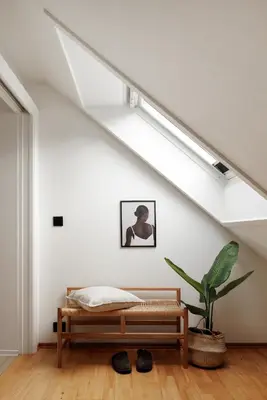 a bedroom with a bed in a loft at Relaxed apartment with a view in Bergen