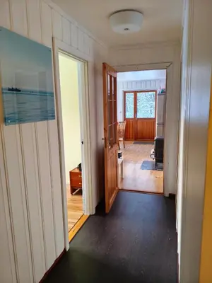 an open door to a room with a hallway at A house for rent in Osen, only 45 min from Trysil in Åmot