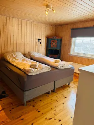 a bedroom with a bed in a room at Cozy cabin in the middle of peaceful surroundings in Geilo