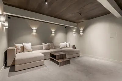 a living room with a couch and a table at Villa with pool and panorama - friend trip,company outing in Trondheim