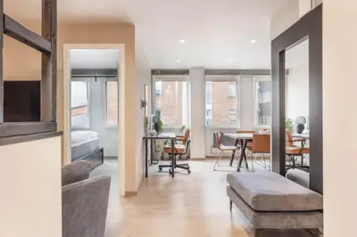 a living room with a couch and a table at Nice apartment with three bedrooms in the middle of Bergen! in Bergen