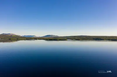 a large body of water with mountains in the background at Modern apartment in Golsfjellet in Gol