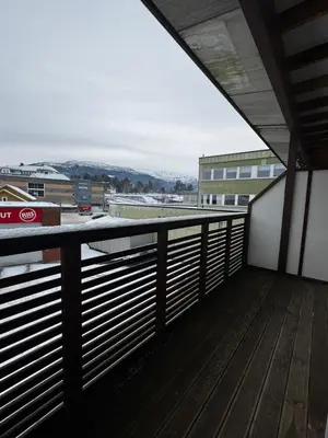 a view from the balcony of a building at Big apartment - Prime Location - Middle of Voss in Vossevangen