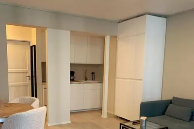a living room with a couch and a table at Cozy apartment in the middle of Bergen city center in Bergen