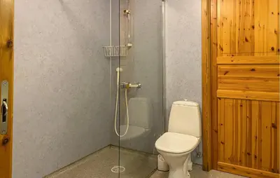 a bathroom with a toilet and a shower at Amazing Apartment In Verma With Wifi in Verma