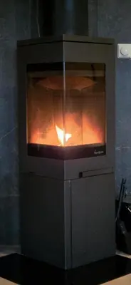 a oven with a fire inside of it at Well-Equipped Cabin Near Rauland Alpine Centre in Rauland