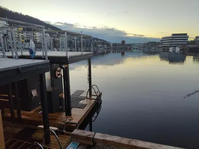a view of a harbor with a dock and the water at Modern apartment in central Bergen in Bergen