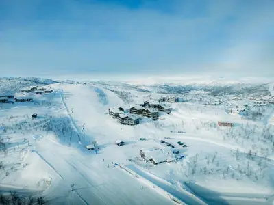 an aerial view of a ski resort in the snow at Kikut Alpin Lodge 2102 in Hol