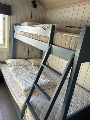 a couple of bunk beds in a room at Mountain cabin in Lillehammer in Lillehammer
