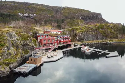 an aerial view of a marina with boats in the water at Kuringen Brygge Hotel and Restaurant in Refsnes