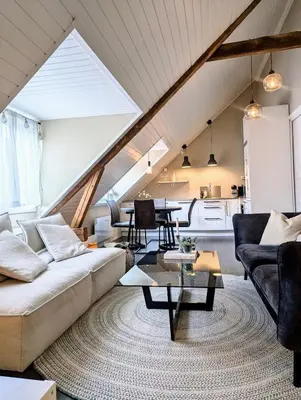 a living room with a couch and a table at Apartment centrally located in Trondheim in Trondheim