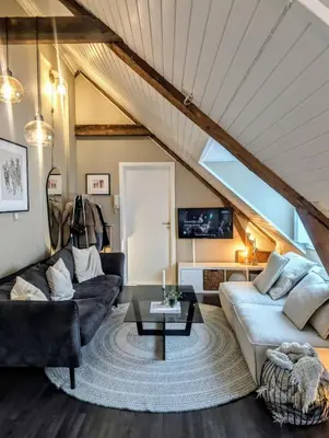 a living room with a couch and a table at Apartment centrally located in Trondheim in Trondheim