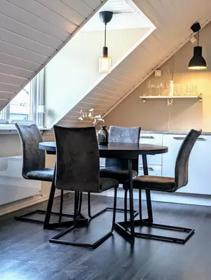 a dining room with a table and chairs at Apartment centrally located in Trondheim in Trondheim