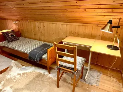 a room with a desk and a bed in a cabin at Magic Cabin by Lake & Forest , Peace, Views & Outdoor Fun, in Opphus