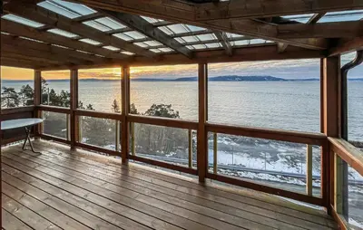 a large room with a view of the water at 2 Bedroom Awesome Home In Vanvikan in Vannvikan