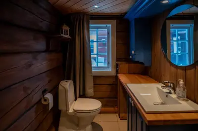 a bathroom with a toilet and a sink at Trysilfjellet Sør 802 Anex in Trysil