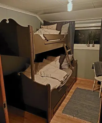 a couple of bunk beds in a room at Llama Lodge 8 beds 4 Bedrooms in Kleivane