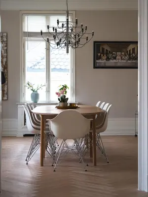 a dining room table with chairs and a chandelier at NEW Listing! Unique Villa in Bergen in Bergen