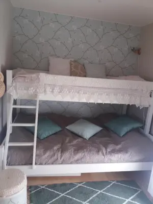 a bunk bed in a room with pillows at Synnseter in Lii