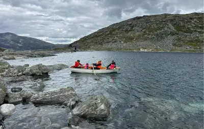 a group of people in a boat on a lake at Gorgeous Apartment In Verma With Wifi in Verma