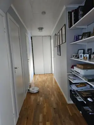 a hallway with a room with a toilet on the floor at Charming and cozy house in Vindafjord in Dørheim