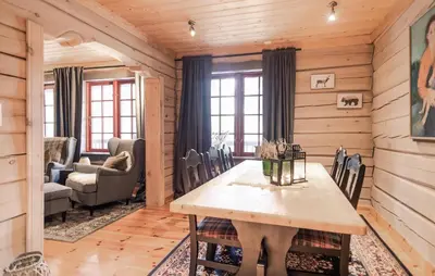a dining room with a table and chairs at 2 Bedroom Gorgeous Apartment In Bjorli in Bjorli