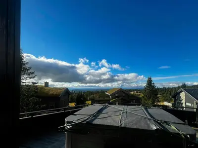 a view of a house with a roof at Family Cabin With Views Of Jotunheimen in Øyer