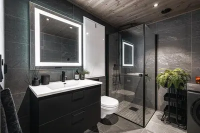 a bathroom with a toilet and a sink and a shower at Two-Storey Penthouse By Hemsedal Ski Resort in Hemsedal