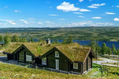 a house with a grass roof on top of it at Log Cabin With A View At Golsfjellet in Gol