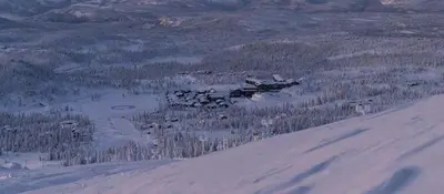 a group of planes flying over a snow covered mountain at New Cabin At Norefjell With Mountain Panorama in Noresund