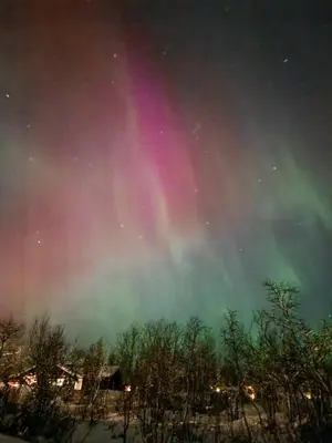an aurora in the sky at night at 6 Bed traditional mountain cabin in Geilo - close to skiing and hiking in Hol
