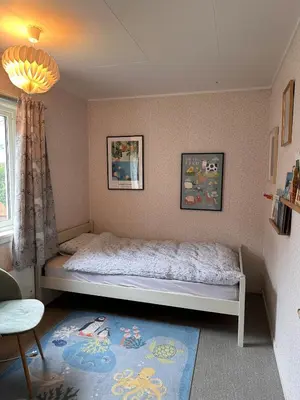 a bedroom with a bed in a room at Perfect family house in Voss in Vossevangen