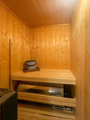 a small kitchen with a counter and a microwave at Apartment With Ski Inout In Fageråsen Trysil in Trysil